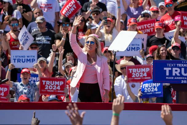 PHOTO: FILE - Republican Representative Marjorie Taylor Greene waves as former US President Donald Trump, not seen, mentions her during a 2024 election campaign rally in Waco, Texas, March 25, 2023. (Suzanne Cordeiro/AFP via Getty Images, FILE)