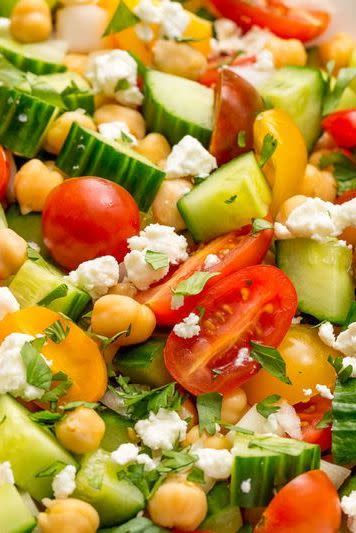 <p>This salad is super easy to throw together.</p><p>Get the <a href="https://www.delish.com/uk/cooking/recipes/a33008226/tomato-cucumber-feta-salad-recipe/" rel="nofollow noopener" target="_blank" data-ylk="slk:Tomato, Cucumber & Feta Salad;elm:context_link;itc:0;sec:content-canvas" class="link ">Tomato, Cucumber & Feta Salad</a> recipe. </p>