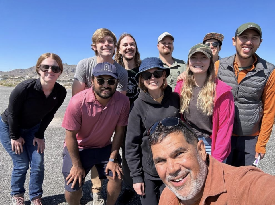 A group of smiling researchers