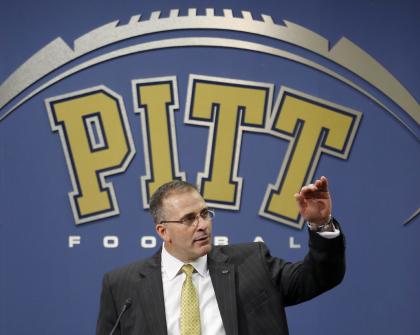 Pat Narduzzi gestures as he speaks at a news conference in Pittsburgh where he was introduced as the new head football coach for Pittsburgh. (AP Photo/Keith Srakocic)