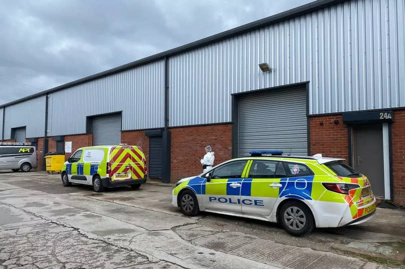 Police were also at a commercial unit on Mitchell Street in Bury -Credit:Manchester Evening News