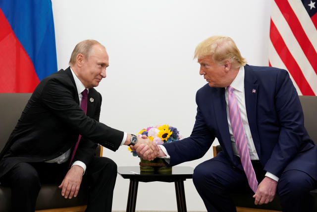 Russia's President Vladimir Putin and U.S. President Donald Trump shake hands during a bilateral meeting at the G20 leaders summit in Osaka, Japan, June 28, 2019.  REUTERS/Kevin Lamarque