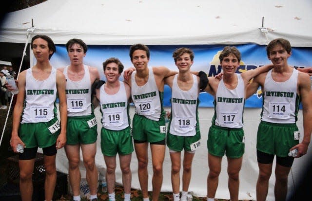 Irvington's boys cross-country team poses after winning the program's first-ever state team title.