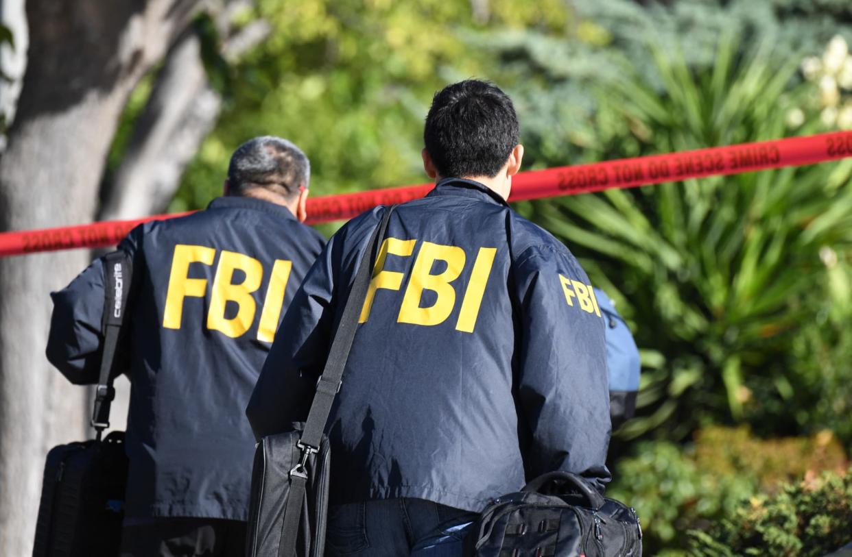 Des agents du FBI sur une scène de crime. (IMAGE D'ILLUSTRATION) - Robyn Beck / AFP