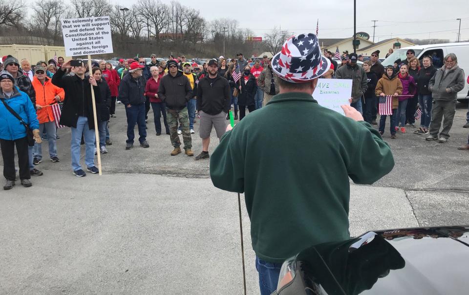 Dan Tarantino, a Realtor from Sussex, addresses participants in a business owners' rally to take place at the Capitol in Madison, on Friday, April 24, 2020.