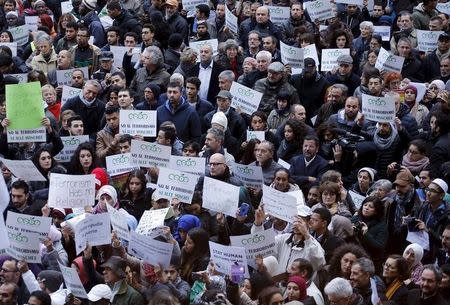 Demonstrators attend a protest called "Not in my name" of Italian muslims against terrorism in downtown Milan, Italy, November 21, 2015. REUTERS/Alessandro Garofalo