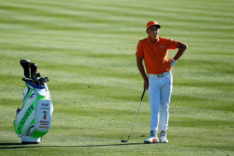 Rickie Fowler waits to take his shot on the first playoff hole during the final round of the Waste Management Phoenix Open at TPC Scottsdale on February 7, 2016 in Arizona