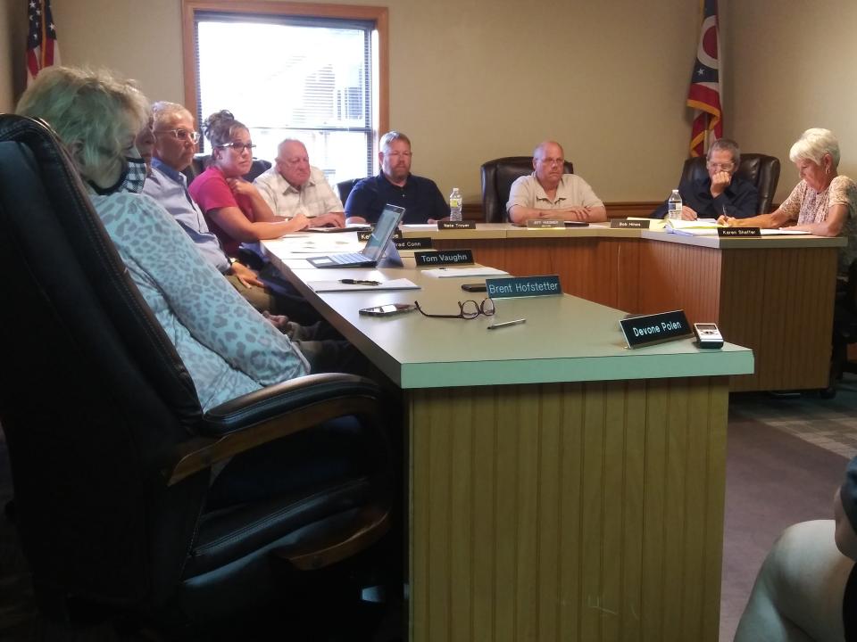 Millersburg council members look on and listen as two residents shared their concerns about the safety of the village.