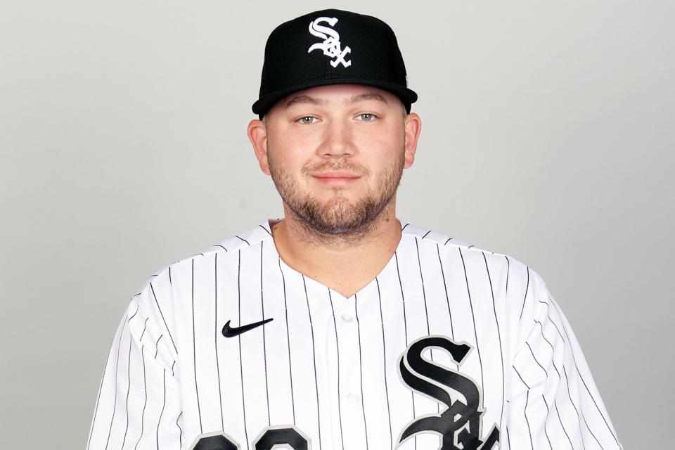 Jake Burger #30 of the Chicago White Sox poses for a photo during the Chicago White Sox Photo Day at Camelback Ranch on Wednesday, March 16, 2022 in Glendale, Arizona.