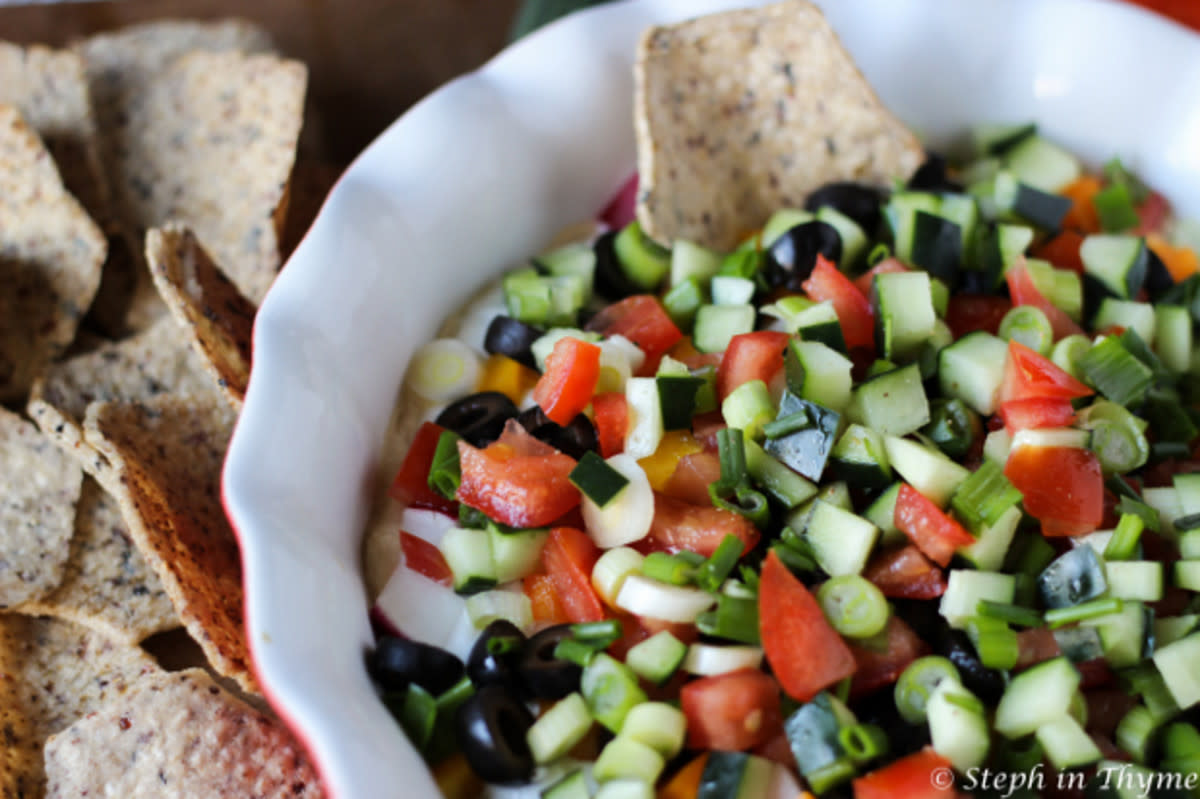 <p>Steph In Thyme</p><p>It's important to eat your vegetables, and what better way to eat them than with this Loaded Veggie Dip? </p><p><strong>Get the recipe: <a href="http://www.stephinthyme.com/loaded-veggie-dip/" rel="nofollow noopener" target="_blank" data-ylk="slk:Loaded Veggie Dip;elm:context_link;itc:0;sec:content-canvas" class="link rapid-noclick-resp">Loaded Veggie Dip</a></strong></p>
