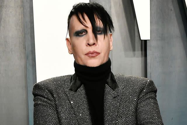 Frazer Harrison/Getty Manson reached a lawsuit settlement with an unnamed woman on Wednesday