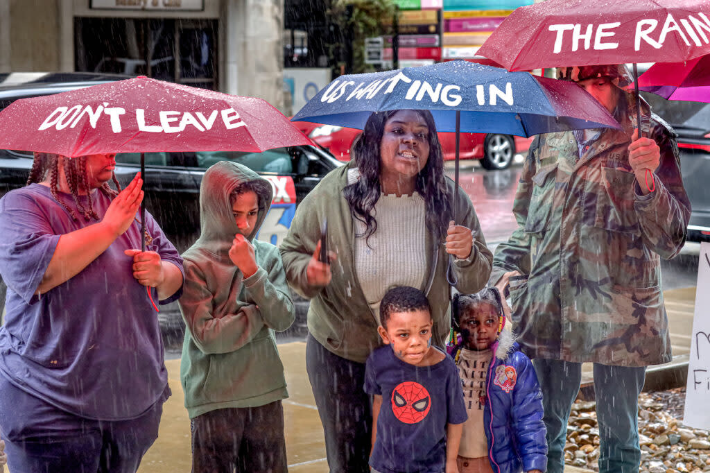 families in the rain