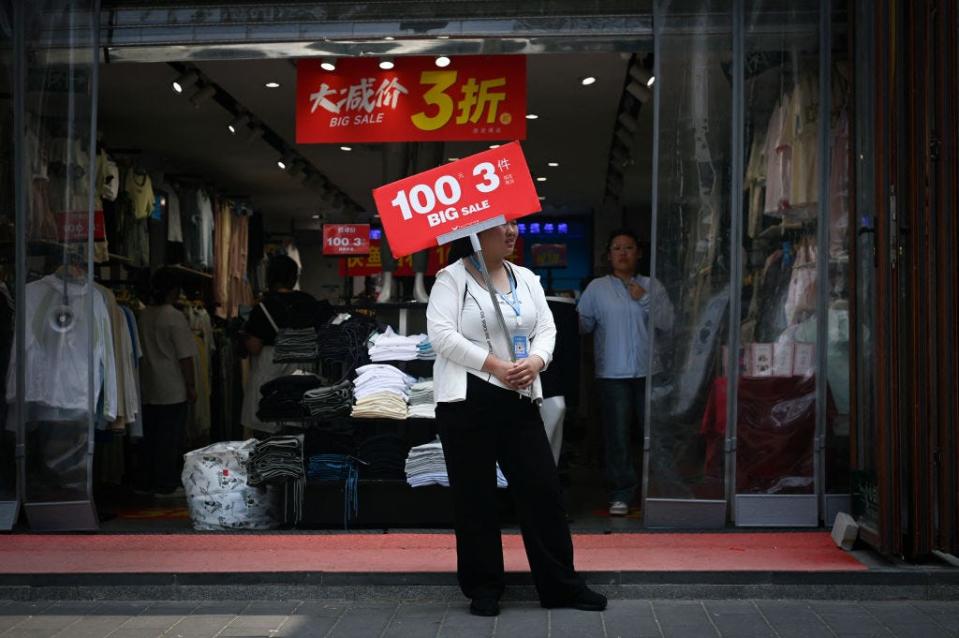 Chinesische Einzelhändler versuchen zunehmend, Kunden mit Rabatten zu locken. - Copyright: Wang Zhao/AFP/Getty Images