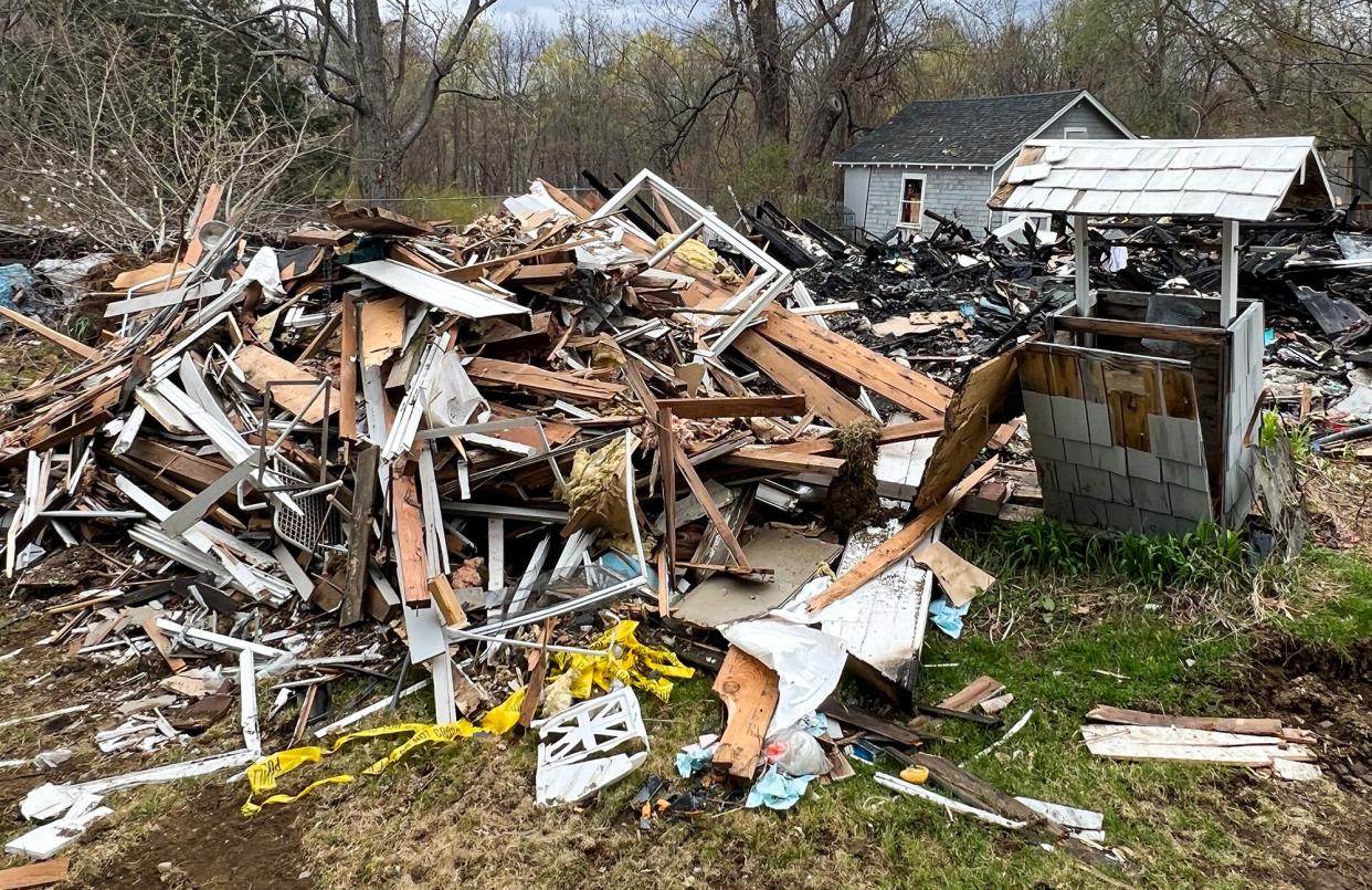 In a file photo, debris covers the site of a home explosion April 14 in Berlin.