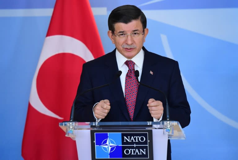 Turkish Prime Minister Ahmet Davutoglu, pictured on November 30, 2015 in Brussels, said, "I wish to say to you that 'yes, the number of the migrants will decline,' but we cannot say this because we don't know what will be going on in Syria"