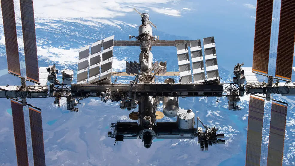  A view of the international space station, with earth seen below. 