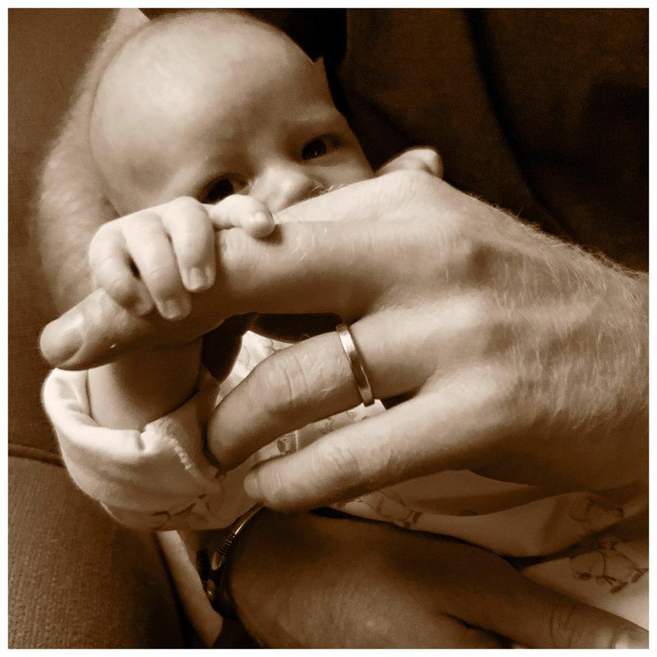 In this undated photo issued by Britain's Prince Harry Duke and Duchess of Sussex of their six-week-old son Archie Harrison Mountbatten-Windsor that they shared on their Instagram account @SussexRoyal to mark Father's Day, Sunday June 16, 2019.  Prince Harry and Meghan Duchess of Sussex are celebrating their first Father's Day together with their son Archie, by sharing this new sepia toned image showing Prince Harry holding Archie, on their royal Instagram account. (The Duke and Duchess of Sussex/@SussexRoyal via AP) MUST BE USED WITH ORIGINAL TONING AS ISSUED - NO SALES - NO COMMERCIAL USE ORG XMIT: LON810