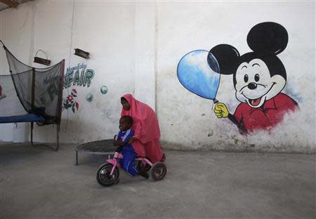 Children play at a guest hotel in Mogadishu October 10, 2013.REUTERS/Feisal Omar