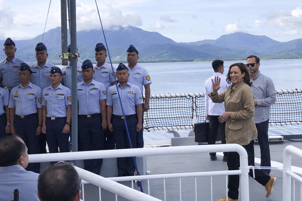 In this photo provided by the Philippine Coast Guard, U.S. Vice President Kamala Harris waves on board the Philippine Coast Guard BRP Teresa Magbanua (MRRV-9701) during her visit to Puerto Princesa, Palawan province, western Philippines on Tuesday, Nov. 22, 2022. (Philippine Coast Guard via AP)