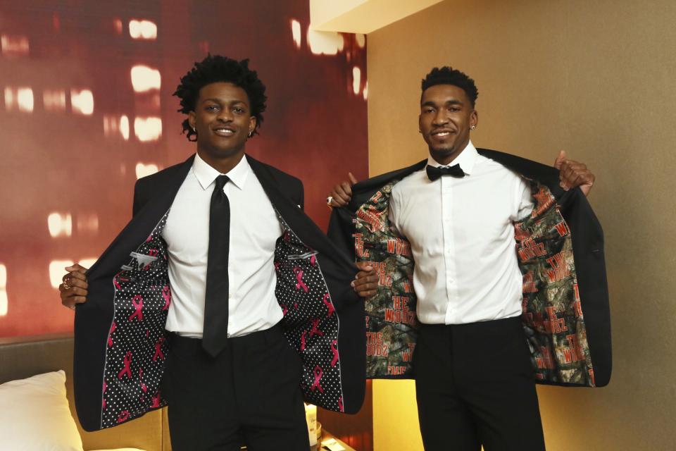 <p>De’Aaron Fox, left, and Malik Monk, right, wear their custom-lined JF J. Ferrar suits available only at JCPenney, as they prepare to head off to the Draft, New York, N.Y., Thursday, June 22, 2017. (Stuart Ramson/AP Images for JCPenney) </p>