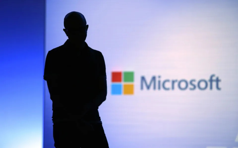 FILE- In this May 7, 2018, file photo Microsoft CEO Satya Nadella looks on during a video as he delivers the keynote address at Build, the company's annual conference for software developers in Seattle. Microsoft is requesting the Federal Election Commission's advisory opinion to make sure Microsoft's new free package of online account security protections for