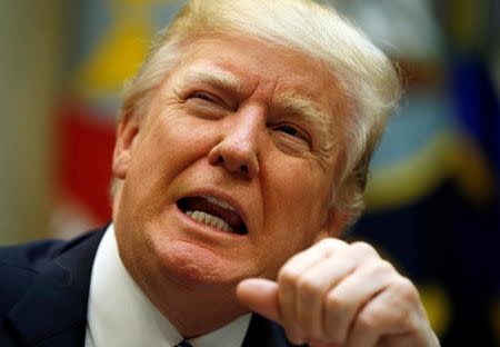 President Trump looks up during a meeting about healthcare at the White House. REUTERS/Kevin Lamarque