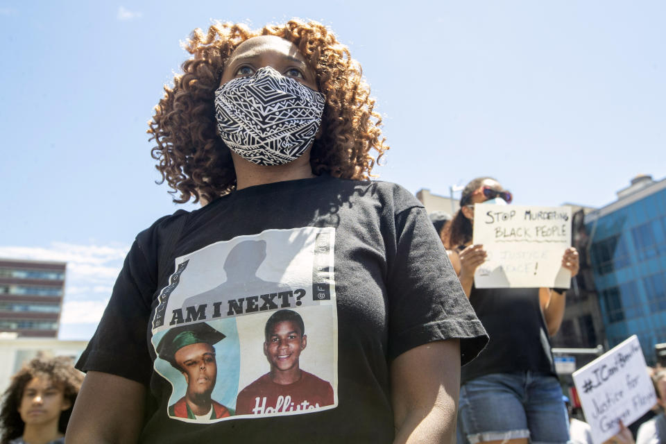 Demonstrators participate in a solidarity rally for George Floyd, Saturday, May 30, 2020, in the Harlem neighborhood of New York. Floyd died after Minneapolis police officer Derek Chauvin pressed his knee into his neck for several minutes even after he stopped moving and pleading for air. (AP Photo/Mary Altaffer)