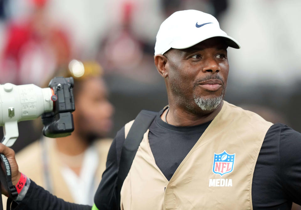 Baseball Hall of Fame player Ken Griffey Jr. works as a photographer for the NFL game between the Arizona Cardinals and the Dallas Cowboys on Sept. 24, 2023.