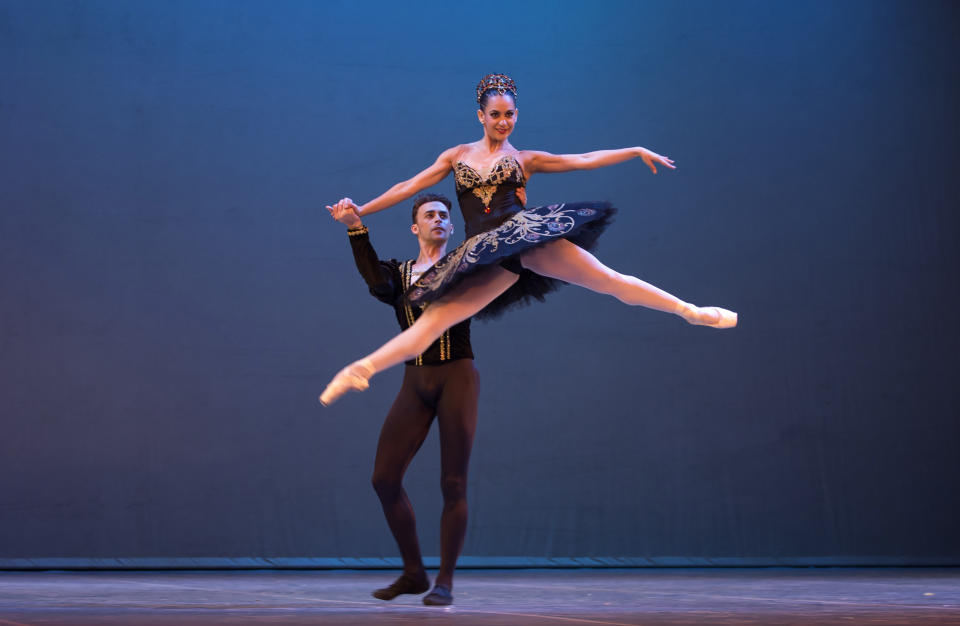 In this Oct. 29, 2018 photo, Cuban expatriate ballet dancers Taras Domitro and Adianys Almeida, top, perform in Havana, Cuba. Cuba has invited a record number of expatriate dancers to its international dance festival. (AP Photo/Desmond Boylan)