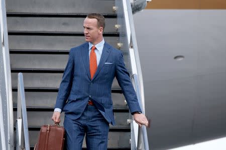 Jan 31, 2016; San Jose, CA, USA; Denver Broncos quarterback Peyton Manning exits a plane during team arrivals at the Mineta San Jose International Airport in preparation of Super Bowl 50 against the Carolina Panthers. Mandatory Credit: Cary Edmondson-USA TODAY Sports