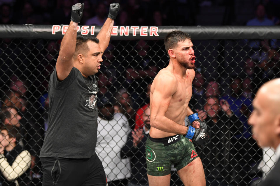 Yair Rodriguez celebrates with his coach Israel Martinez after knocking out Chan Sung Jung of South Korea during UFC Fight Night inside Pepsi Center on Nov. 10, 2018 in Denver, Colorado. (Getty Images)