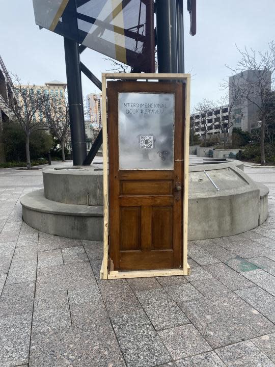 A standalone door mysteriously appeared at the Gallivan Center in downtown Salt Lake City on Thursday, March 28. (Courtesy: Consistent-Wheel5711 via Reddit)