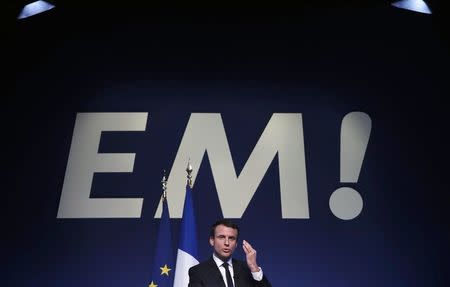 Emmanuel Macron, head of the political movement En Marche !, or Onwards !, and candidate for the 2017 French presidential election, speaks during a news conference to unveil his fully budgeted manifesto, named a "contract with the nation", in Paris, France, March 2, 2017. REUTERS/Christian Hartmann