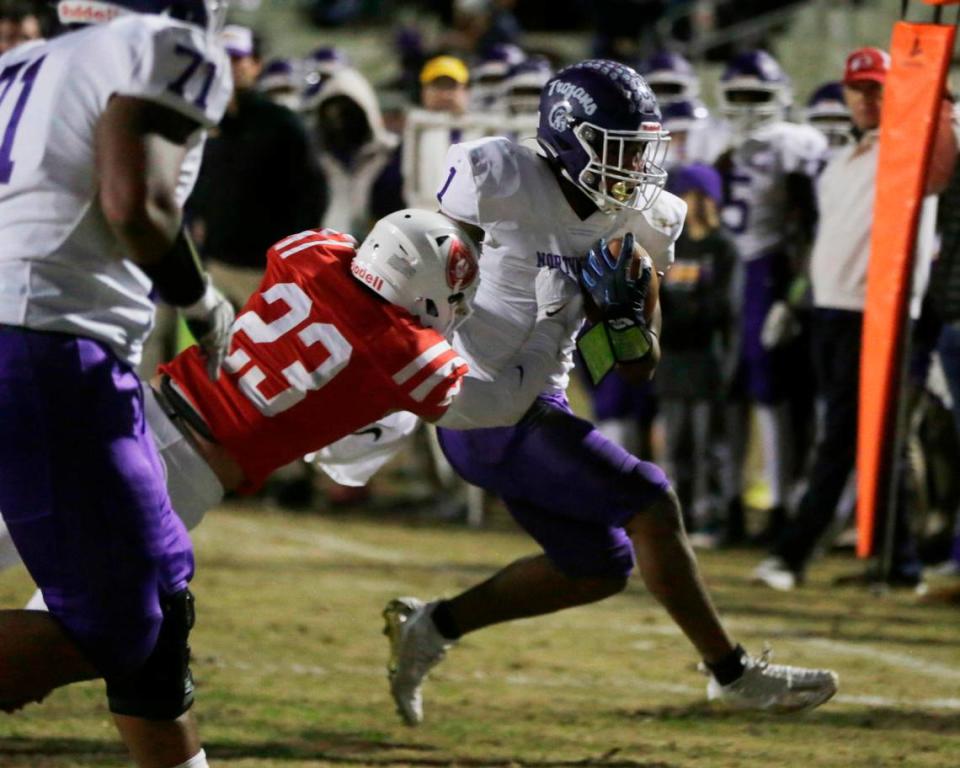 Northwestern’s Turbo Richard scores a touchdown Friday at the Class 4A Upperstate Championship game in Greenville, S.C. against Greenville HIgh School.