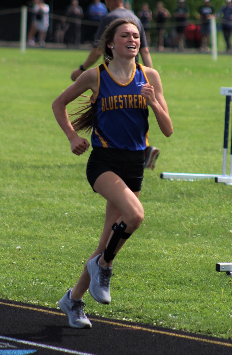 Ida's Kaylee Stein finishes in first place in the 800-meter run during the Division 3 Regional Saturday, May 21, 2022 at Whiteford.