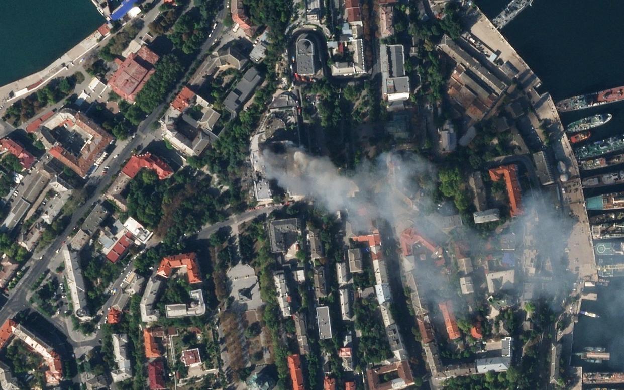 A satellite image showing smoke from the Russian Black Sea Navy headquarters