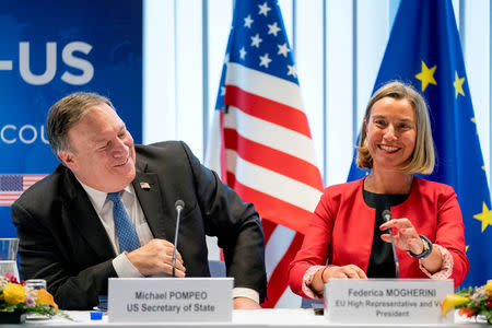 FILE PHOTO: U.S. Secretary of State Mike Pompeo, left, and European Union foreign policy chief Federica Mogherini, speak at a meeting in Brussels, Belgium, July 12, 2018. Andrew Harnik/Pool via REUTERS/File Photo