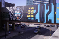 Signage on a crosswalk near the Final Four round of the NCAA tournament at Lucas Oil Stadium in Indianapolis, Saturday, April 3, 2021. (AP Photo/AJ Mast)