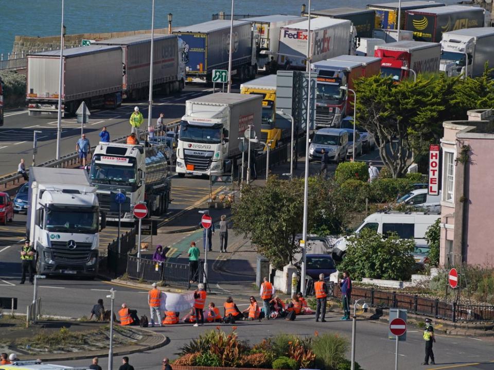 Protesters from Insulate Britain block the A20 in Kent, which provides access to the Port of Dover in Kent (Gareth Fuller/PA)