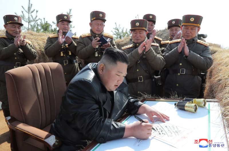 North Korean leader Kim Jong Un guides artillery fire competition in this image released by North Korea's Korean Central News Agency