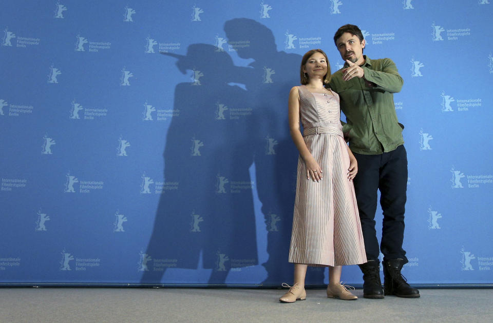FILE - In this Feb. 8, 2019 file photo, Actor Casey Affleck and actress Anna Pniowsky pose for the photographers during a photo call for the film 'Light of My Life' at the 2019 Berlinale Film Festival in Berlin, Germany. (AP Photo/Michael Sohn)