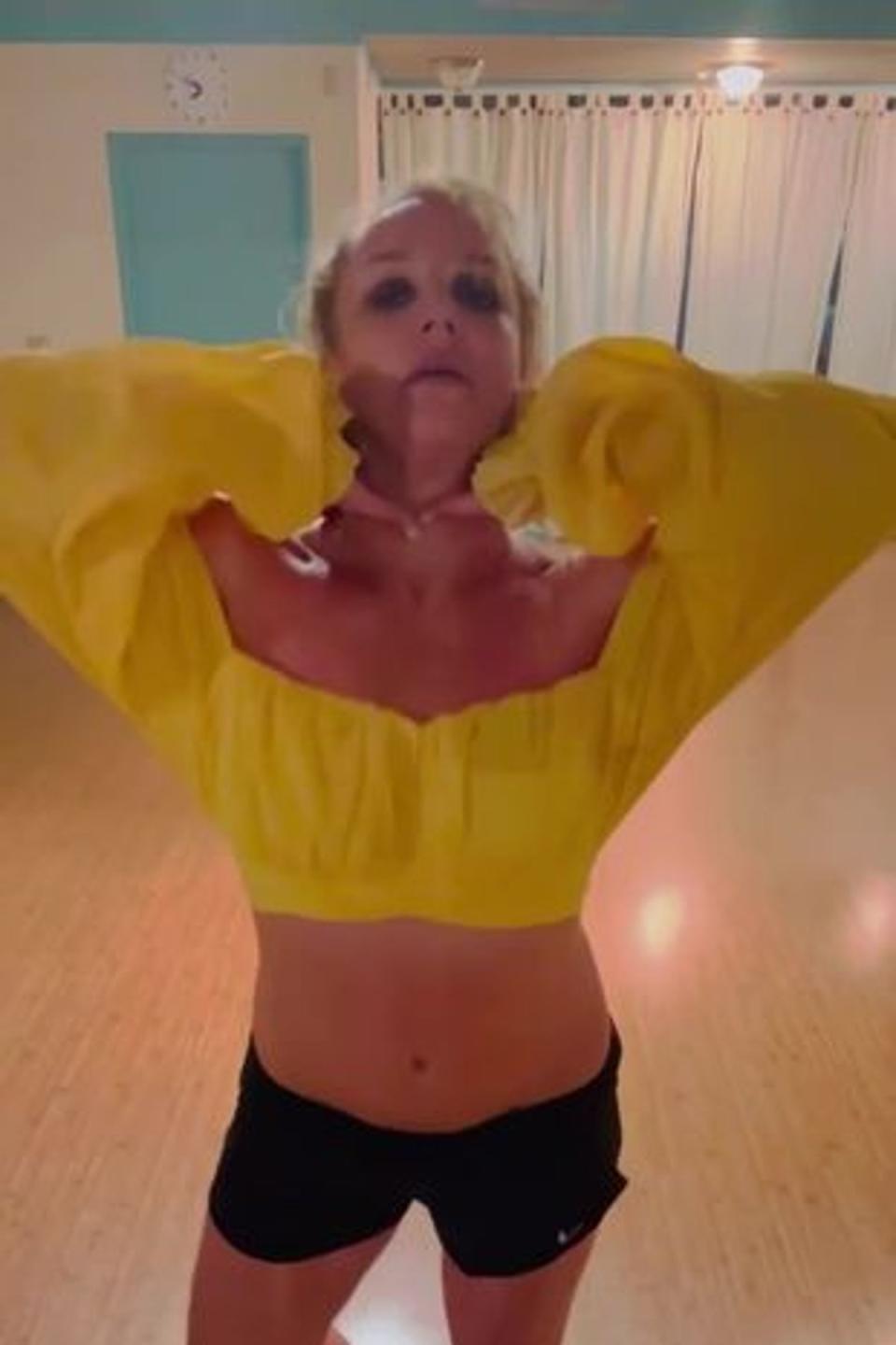 Britney, pictured pretending to choke herself in an Instagram video, has been worrying fans with her erratic behaviour on social media (Instagram/BritneySpears)