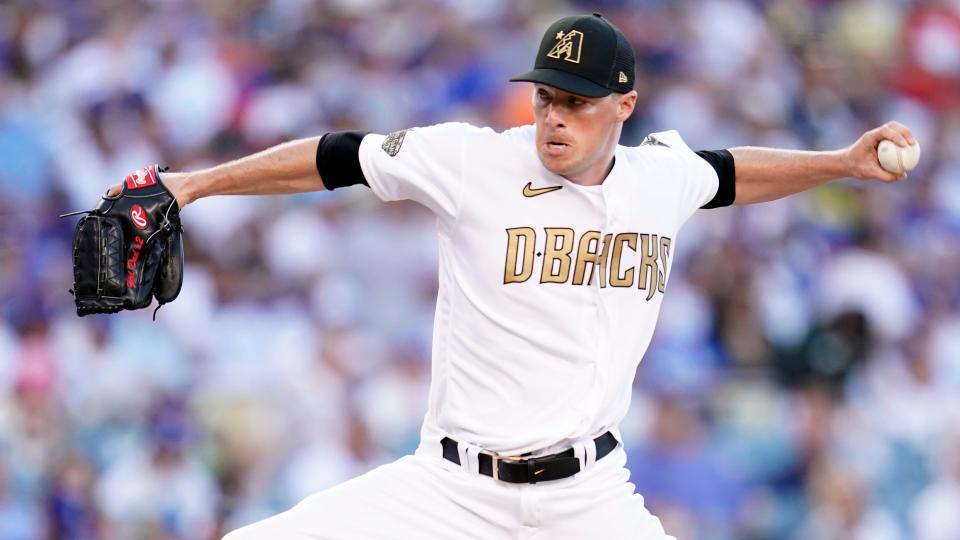 National League relief pitcher Joe Mantiply, of the Arizona Diamondbacks, throws to a American League batter during the fifth inning of the MLB All-Star baseball game, Tuesday, July 19, 2022, in Los Angeles. (AP Photo/Abbie Parr)