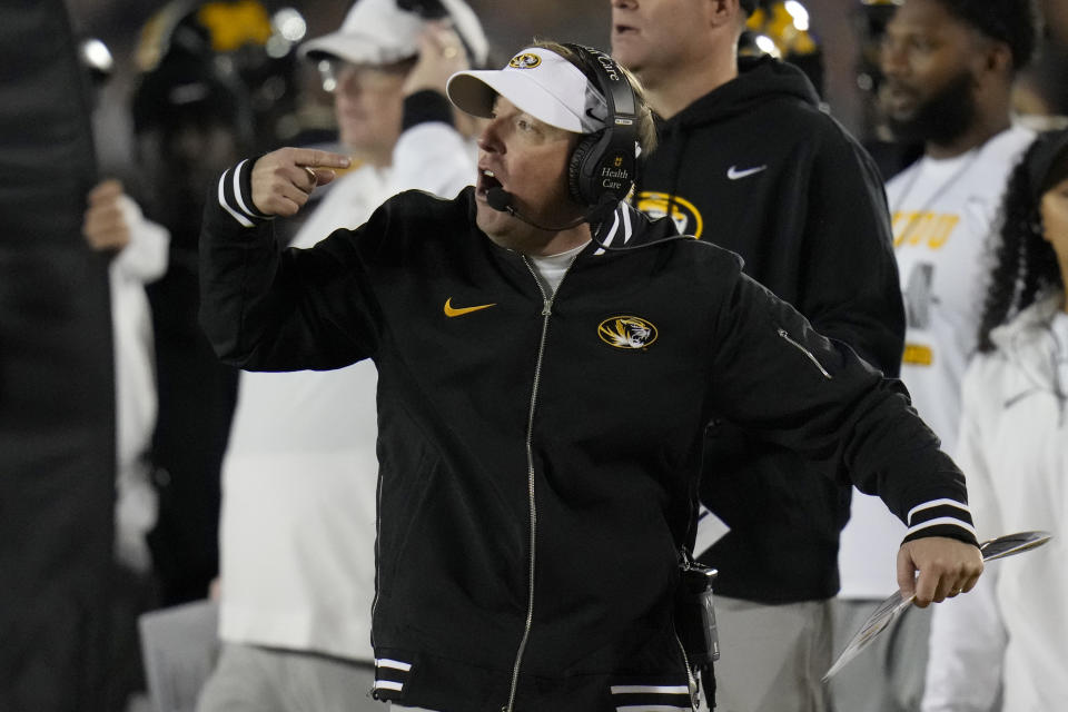 Missouri head coach Eliah Drinkwitz yells on the sidelines during the first half of an NCAA college football game against Florida Saturday, Nov. 18, 2023, in Columbia, Mo. (AP Photo/Jeff Roberson)