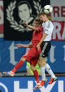 Portuguese defender Fabio Coentrao (L) vies with German forward Thomas Mueller during the Euro 2012 championships football match Germany vs Portugal on June 9, 2012 at the Arena Lviv. AFP PHOTO / JEFF PACHOUDJEFF PACHOUD/AFP/GettyImages