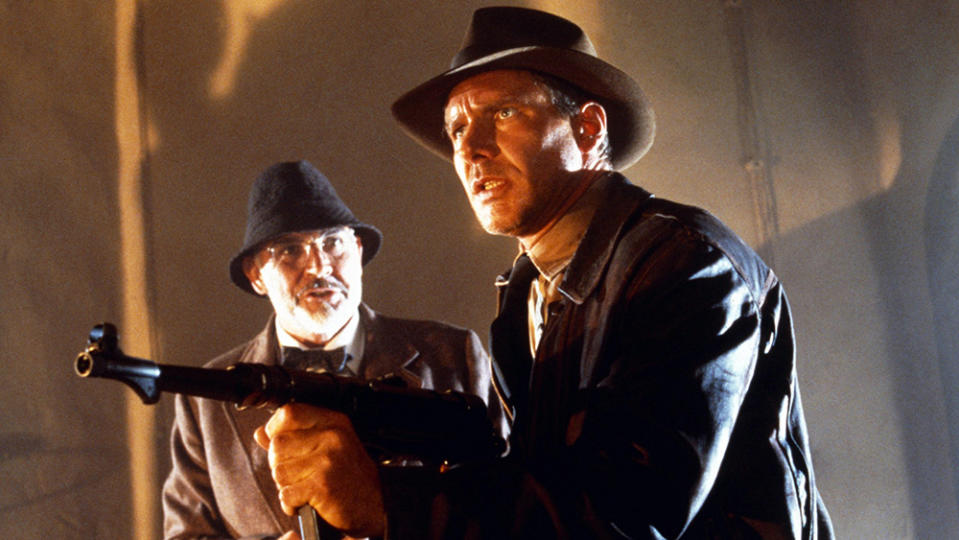 INDIANA JONES AND THE LAST CRUSADE, from left: Sean Connery, Harrison Ford as Indiana Jones, 1989. ©Paramount Pictures/courtesy Everett Collection