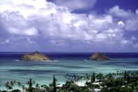 Hawaii’s Lanikai means “heavenly sea.” Warm turquoise waters and happy sunshine make this island a piece of heaven on earth. 