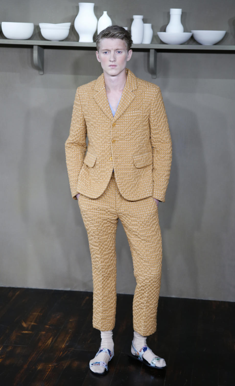 A model wears a creation for Carven's Spring-Summer 2014 men's collection, presented Wednesday, June 26, 2013 in Paris. (AP Photo/Francois Mori)