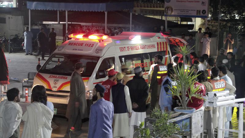 Rescue workers unload earthquake victims from an ambulance at a hospital in Saidu Sharif, a town Pakistan’s Swat valley, Tuesday, March 21, 2023. A magnitude 6.5 earthquake rattled much of Pakistan and Afghanistan late Tuesday, sending panicked residents fleeing from homes and offices and frightening people even in remote villages.