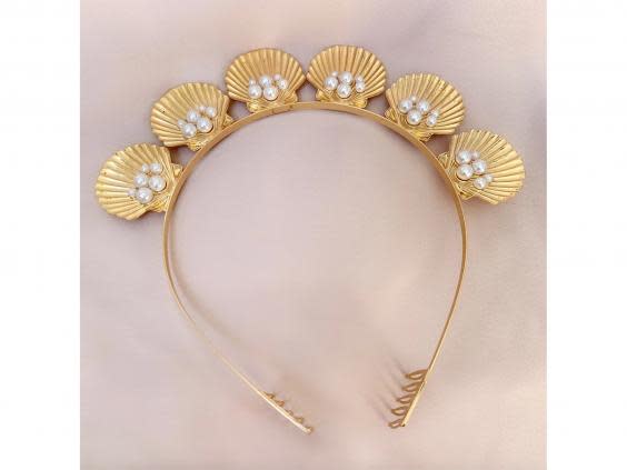 An ode to the seaside, we love the pearl detailing on this gold band (French Fashion House)